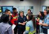 Emergency responders collaborating in a command center.