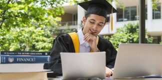 Graduate student studying finance on a university campus.