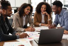 Diverse professionals collaborating in a modern finance setting.