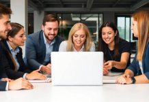 Team members collaborating in a modern office setting.