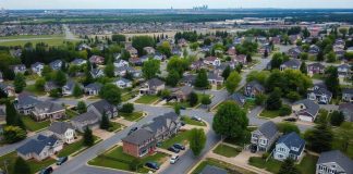 Suburban neighborhood with single-family homes and greenery.