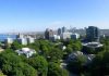 Greenwich, Connecticut skyline with modern buildings and greenery.