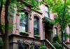 Photograph of a New York City brownstone home.