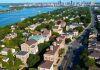 Aerial view of Greenwich CT showcasing waterfront properties and skyline.